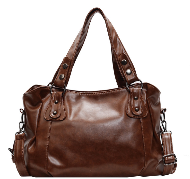 Velloura handtas in vier kleuren: zwart, koffie, rood en bruin