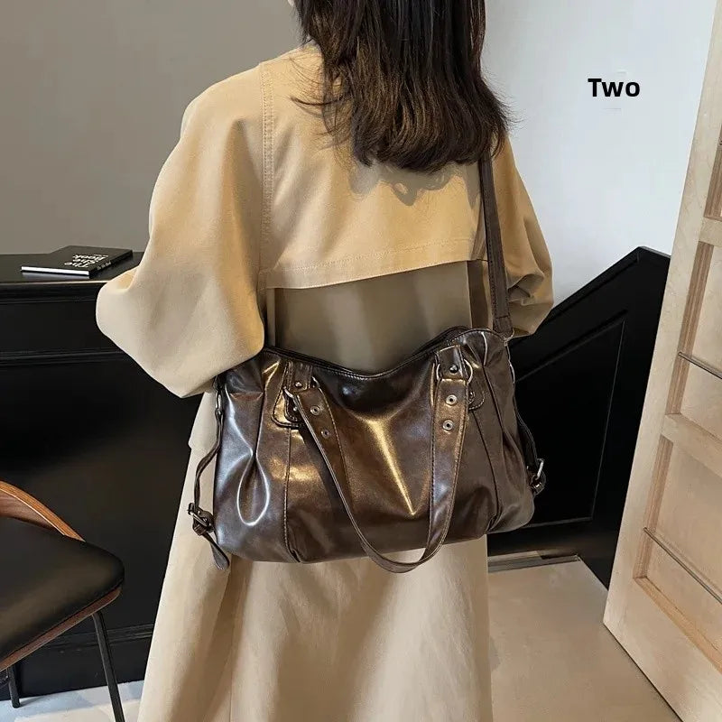 Velloura handtas in donkerbruin met crossbody band